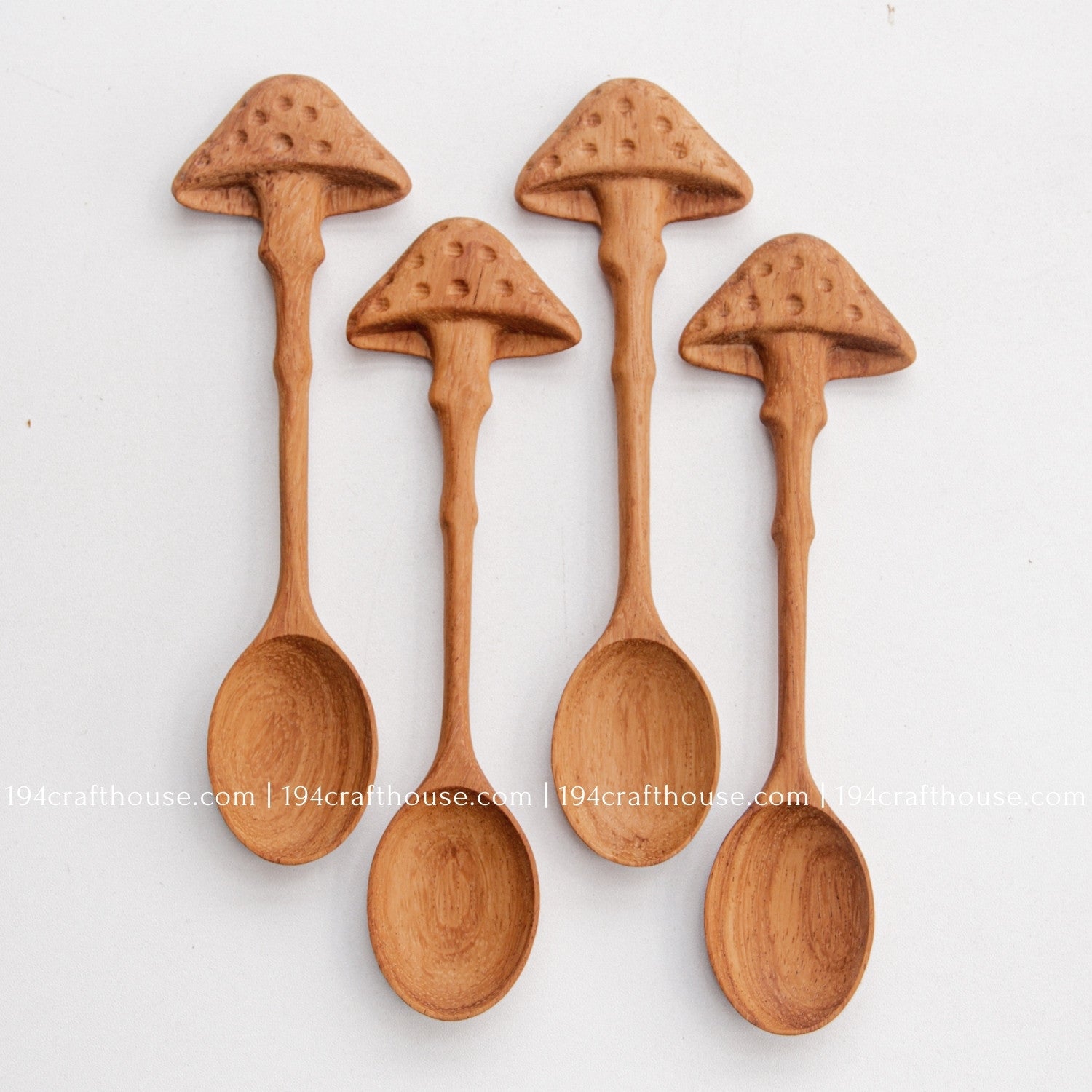 Collection of four hand-carved mushroom wooden spoons for coffee, tea, and gifting