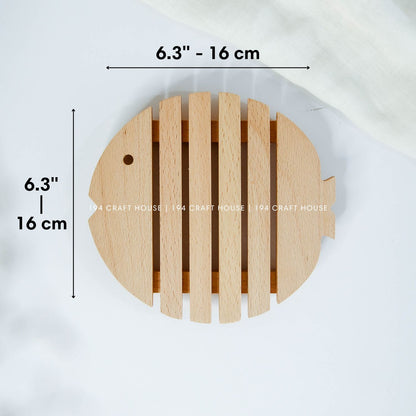 Fish-shaped wooden trivet with detailed measurements and handcrafted slatted design
