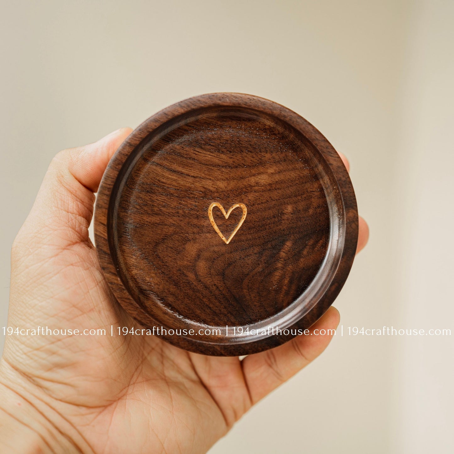 Round walnut wood ring dish with minimalist gold heart engraving, ideal for rings and small keepsakes
