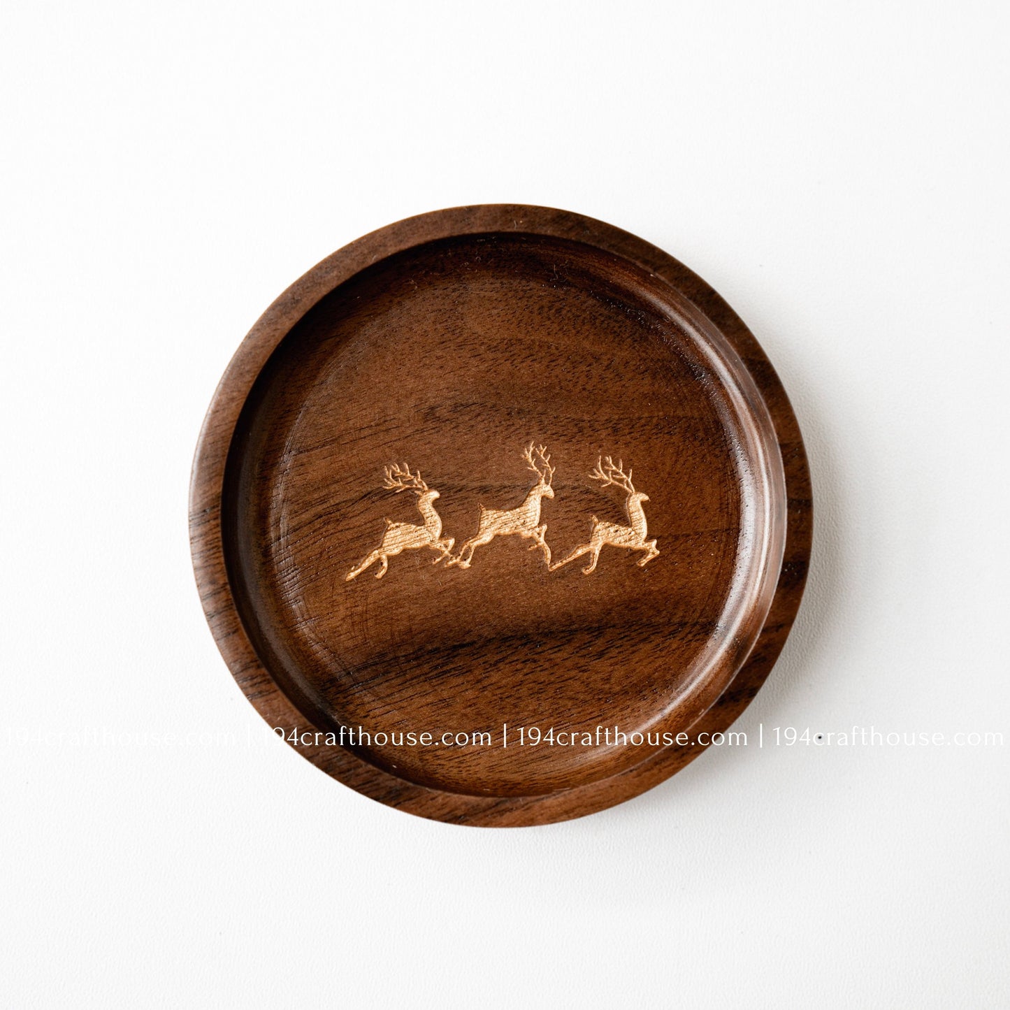 Handmade walnut wood jewelry dish with engraved deer trio design and rich natural wood grain
