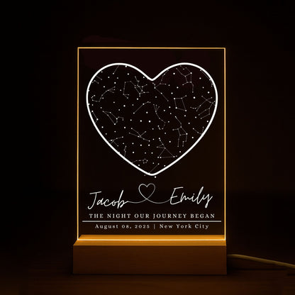 LED star map lamp with a warm yellow glow illuminating personalized names, location and date