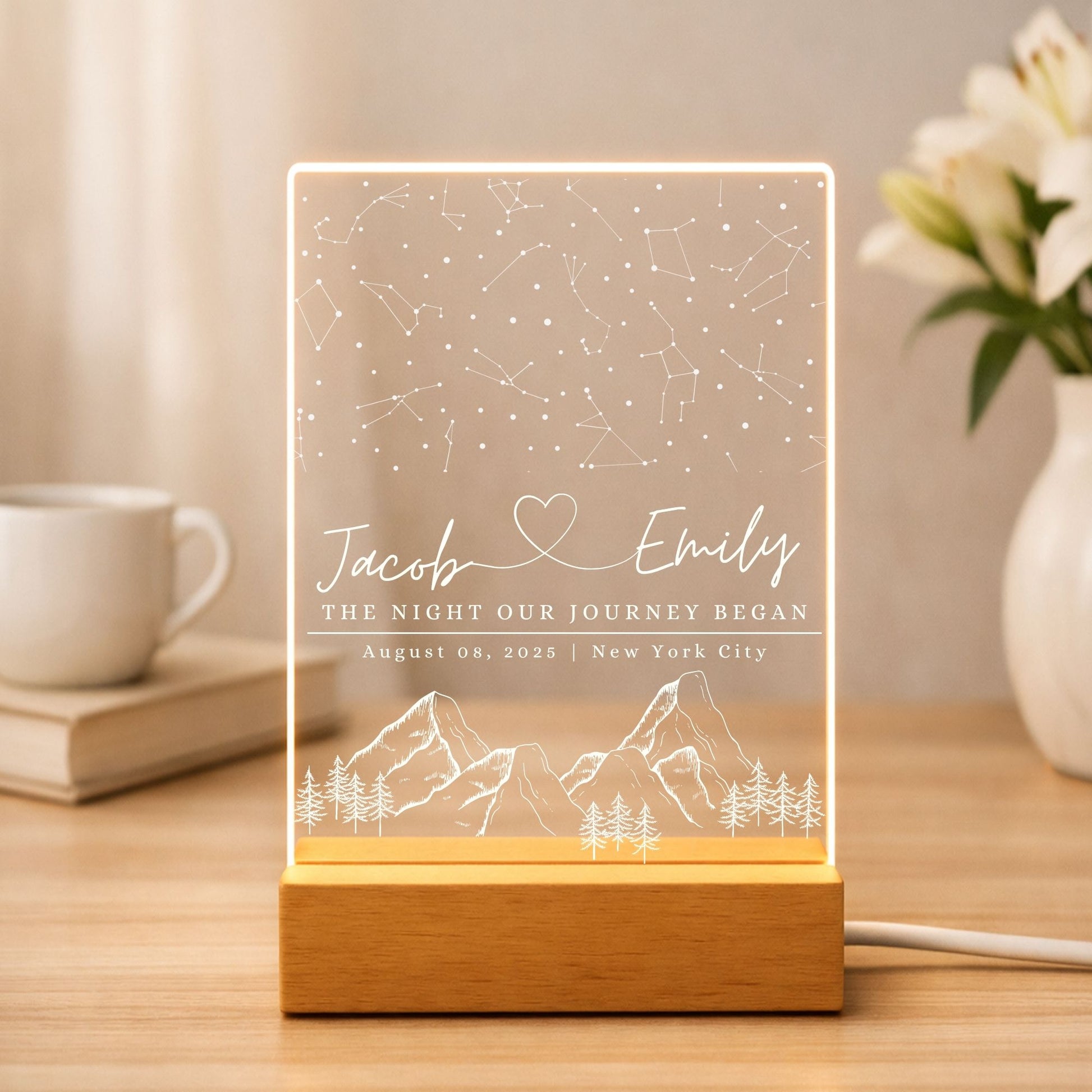 Custom star map engraved on a sleek acrylic plaque with a minimalist wooden LED base.