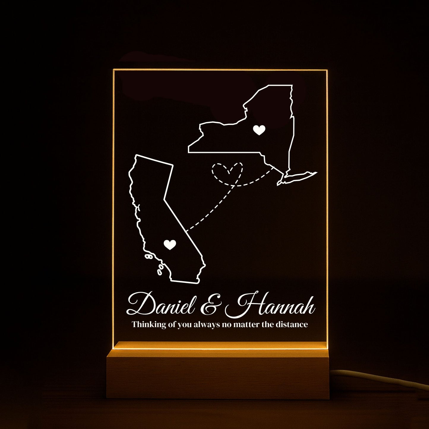 Engraving aconnecting two states on a polished acrylic night light.