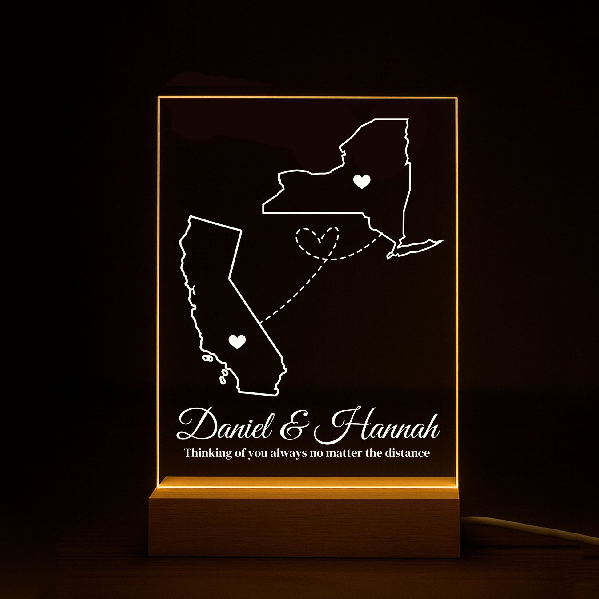 Engraving aconnecting two states on a polished acrylic night light.