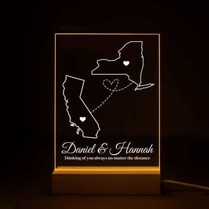 Engraving aconnecting two states on a polished acrylic night light.