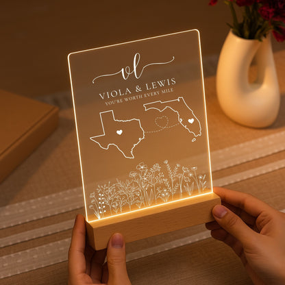 Two-state map night light with custom city-specific heart markers and a romantic quote.