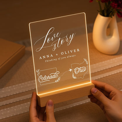 Minimalist wooden LED base holding a glowing acrylic sheet with custom state maps.
