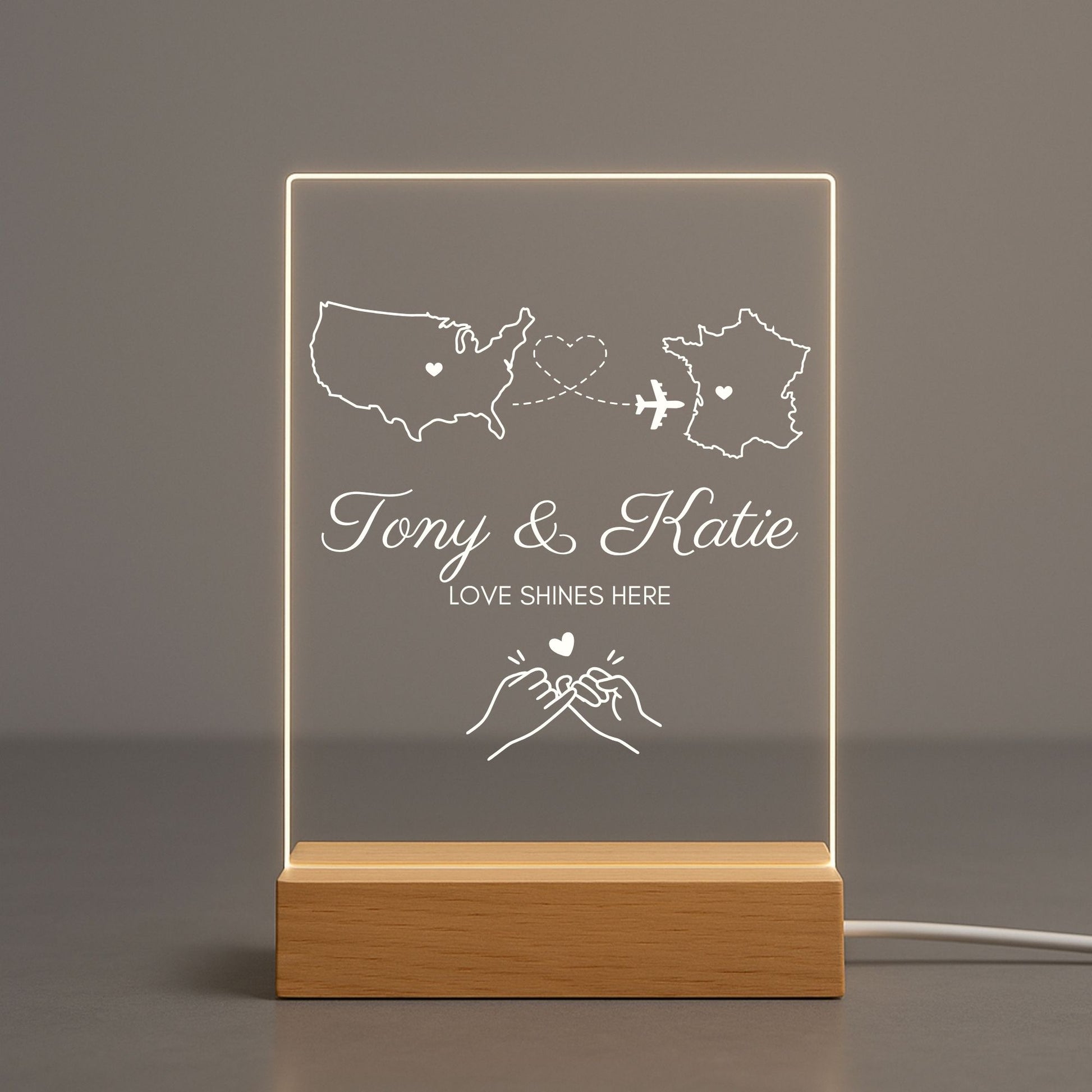 Detailed view of the dotted heart path connecting two states on a clear night light.