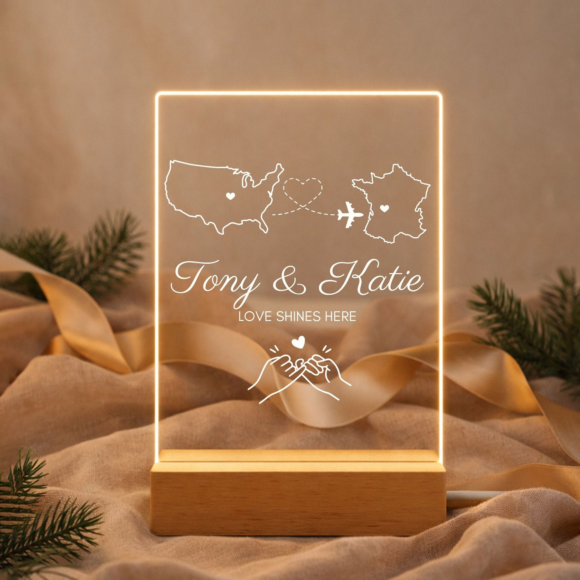 Acrylic plaque featuring two engraved states and a couple's names.