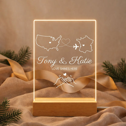 Acrylic plaque featuring two engraved states and a couple's names.