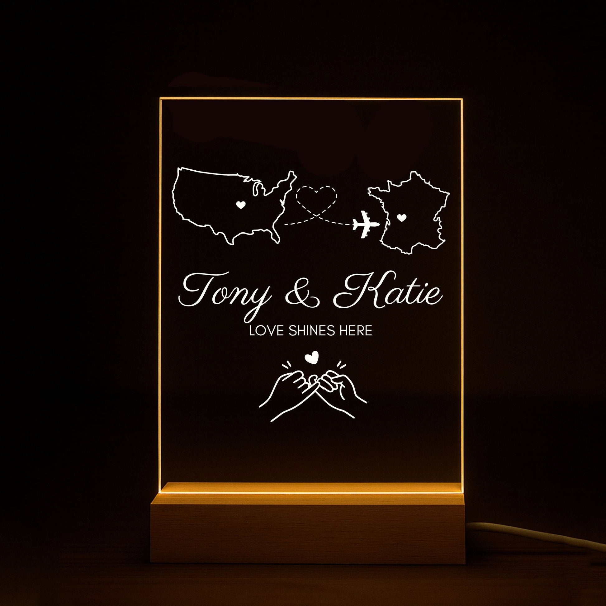 Meaningful long-distance relationship gift: an acrylic lamp connecting two home states.