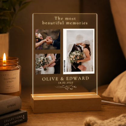 Custom 3-photo collage acrylic night light featuring polaroid-style wedding photos, names, date, and floral branch art glowing warm LED light on a table.