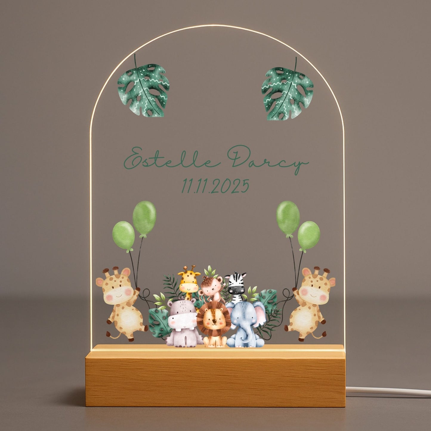 Personalized animal baby night light featuring a watercolor lion illustration on an acrylic plate with solid wood base.