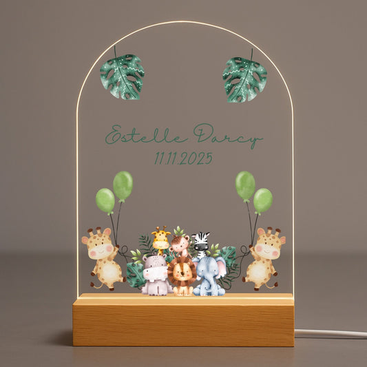 Personalized animal baby night light featuring a watercolor lion illustration on an acrylic plate with solid wood base.