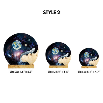 Three sizes of decorative epoxy resin lamp with a space-themed design on a white background