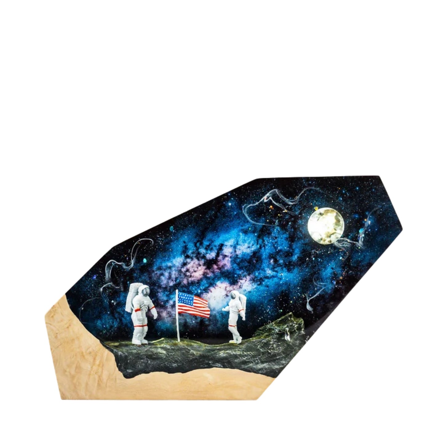 Handcrafted moon landing epoxy resin night light on a wooden base isolated on a white background, featuring two miniature astronauts planting an American flag on the lunar surface against a vibrant blue and purple starry galaxy backdrop with a full moon.