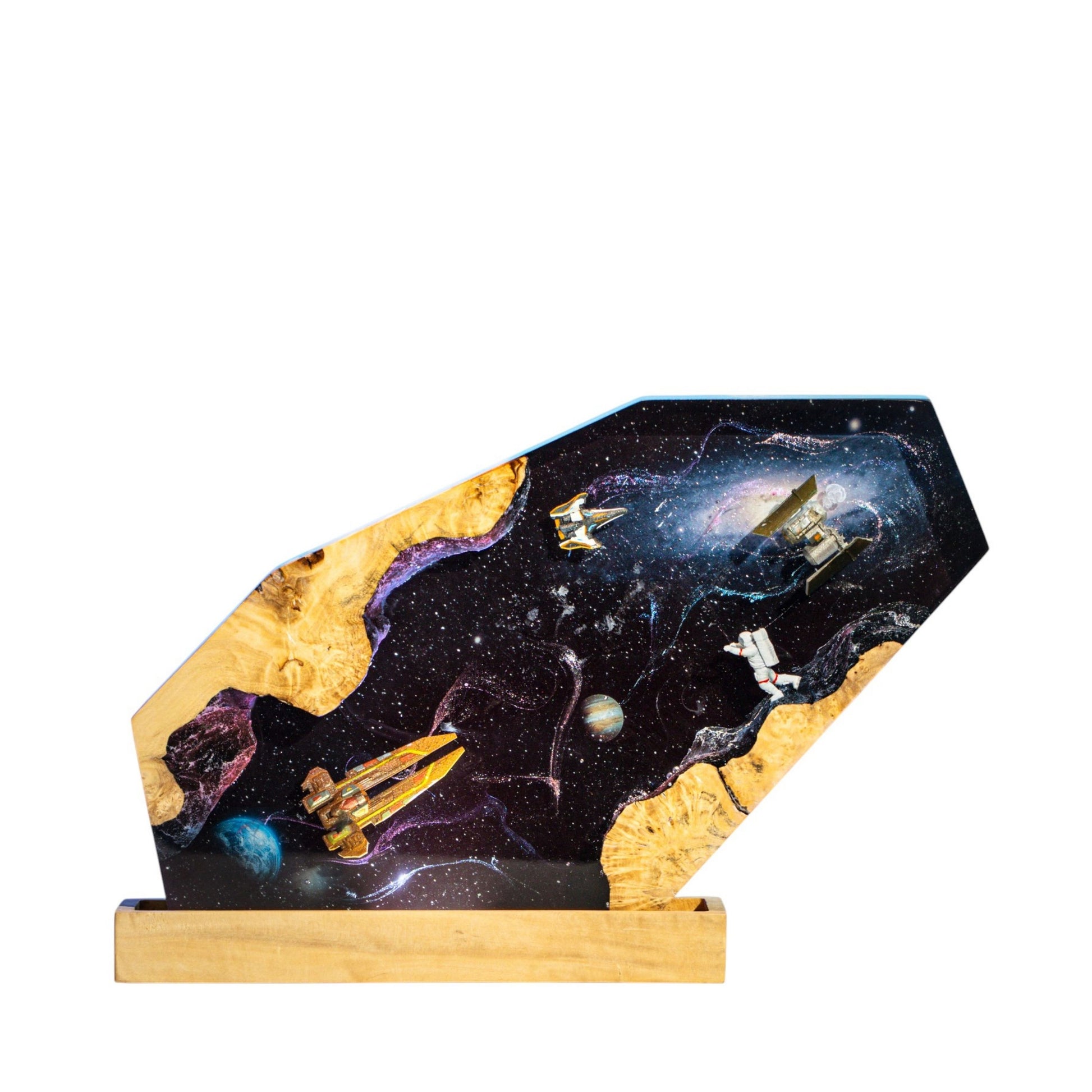 Handcrafted space exploration epoxy resin night light on a wooden base isolated on a white background, featuring miniature spaceships, a satellite station, and an astronaut floating through a dark starry cosmos with detailed planets and a glowing dust nebula.