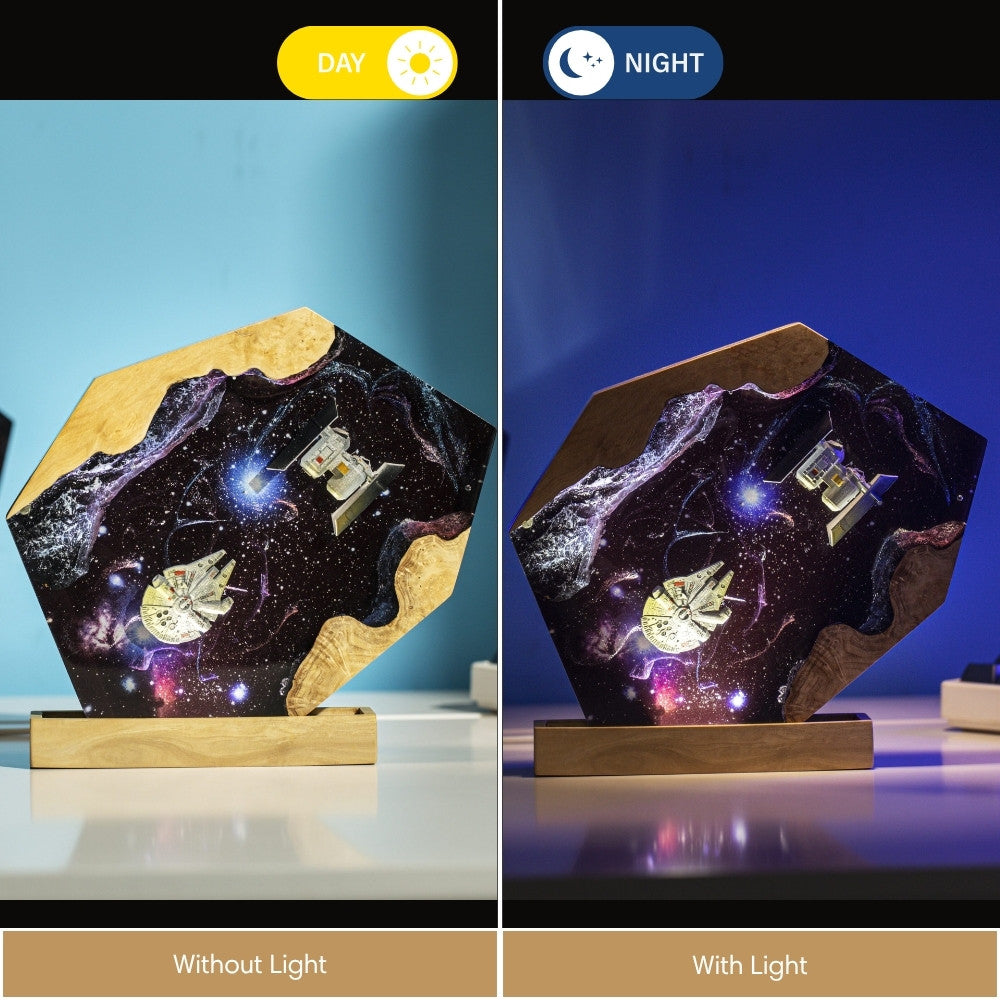 Handmade galaxy resin art lamp illuminated on desk, showcasing warm LED glow through space-themed epoxy resin