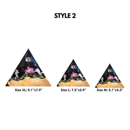 Size comparison chart showing three different scales of the triangular astronaut resin lamp, labeled with dimensions for small, medium, and large versions.