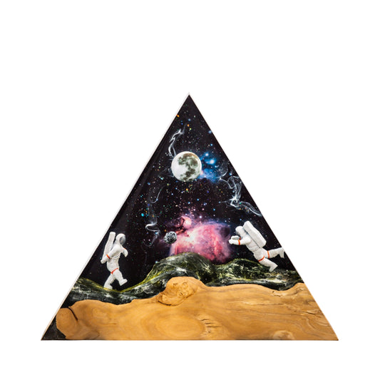 riangular handmade epoxy resin lamp on a white background, featuring a highly detailed miniature astronaut floating in a nebula-inspired space scene with a wooden base.