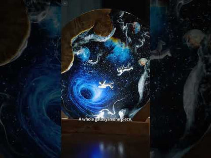 Astronaut space epoxy resin and wood night light showcasing a detailed hand-carved galaxy scene handmade by 194 Craft House